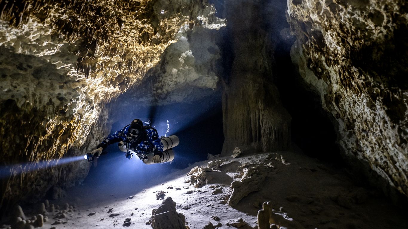 Matt Scantland exploring caves of Mayakoba at Rosewood