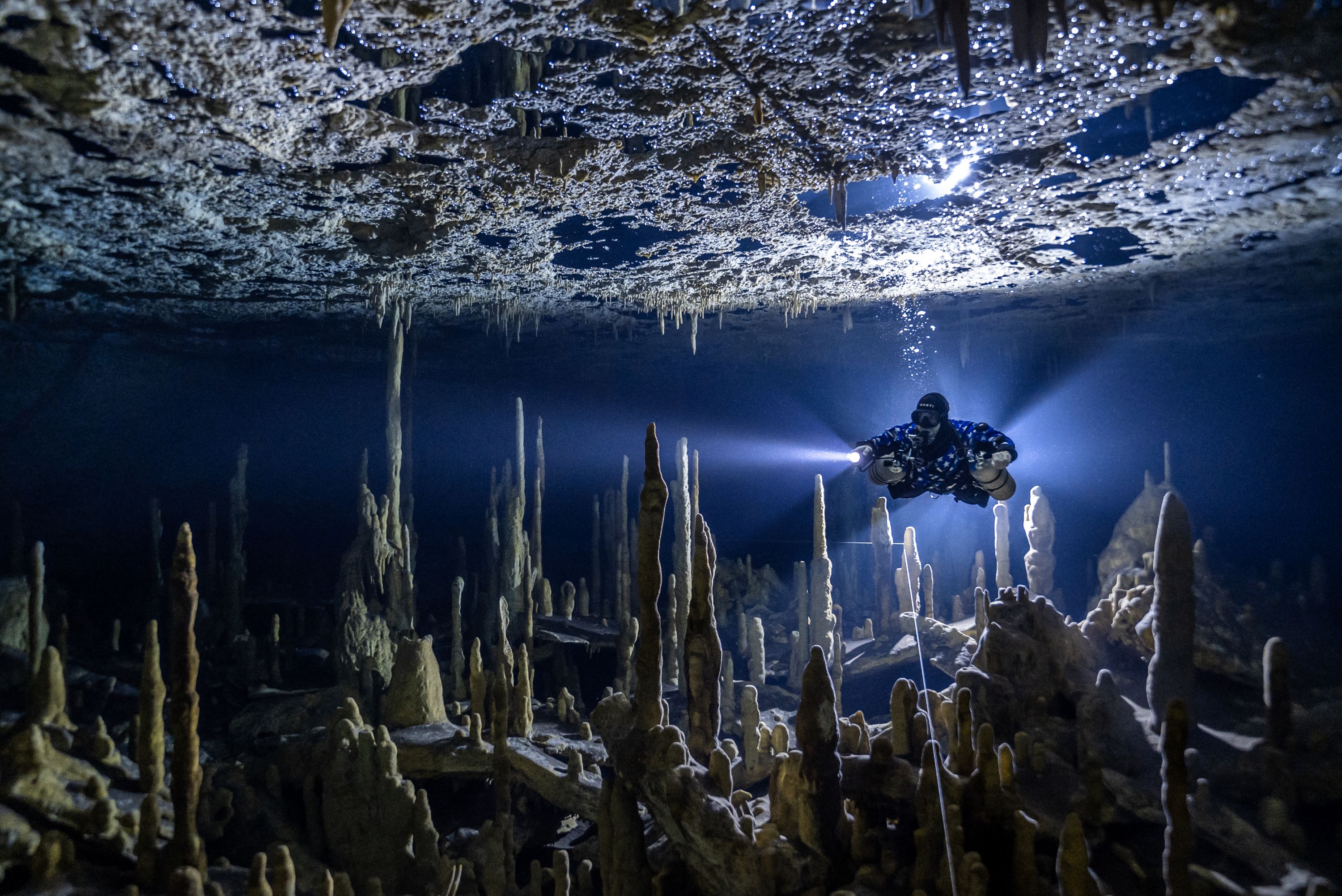 Matt Scantland exploring caves of Mayakoba at Rosewood