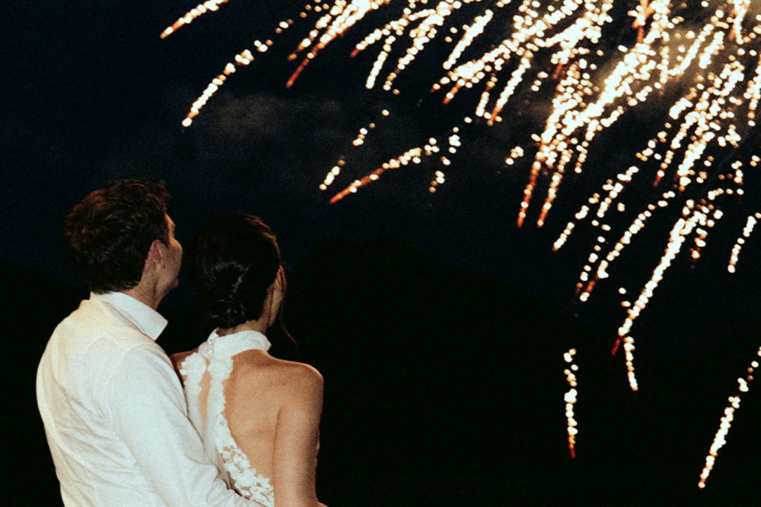 Guest table toasting glasses