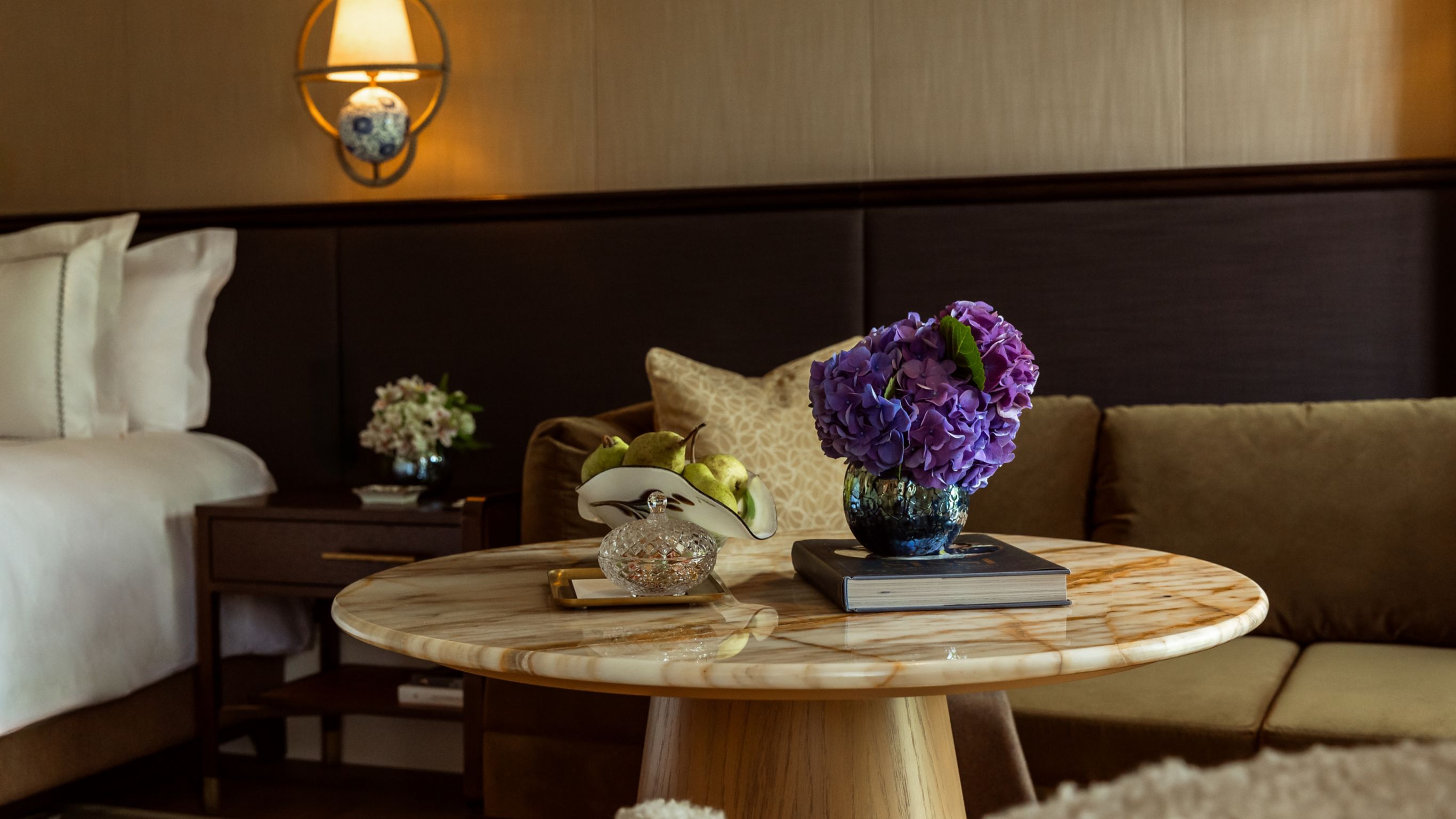 Detail shot of flowers and decoration in coffee table