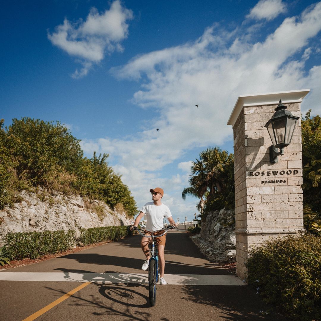 Guest on bicycle leaving the resort 