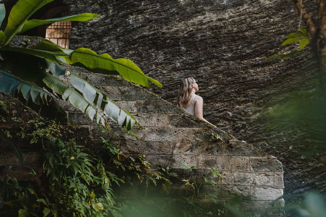 Traveler descending staircase in Fort Hamilton Moat Garden