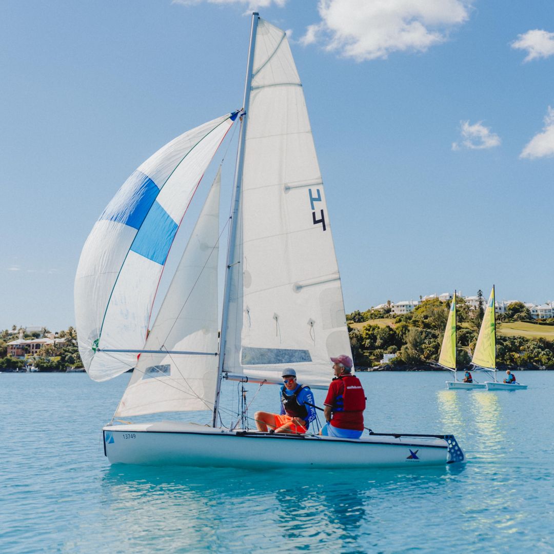 Guests taking sailing lessons