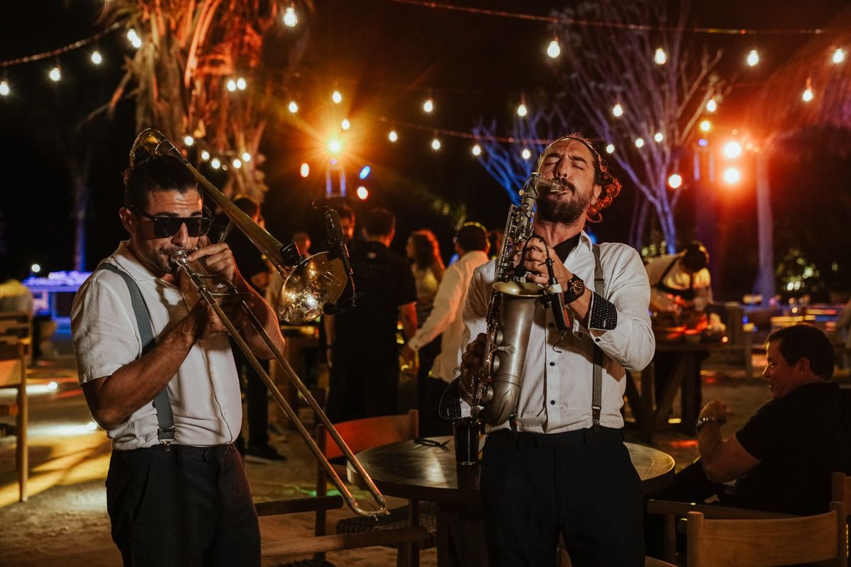 musicians at aqui me quedo night shot at rosewood mayakoba