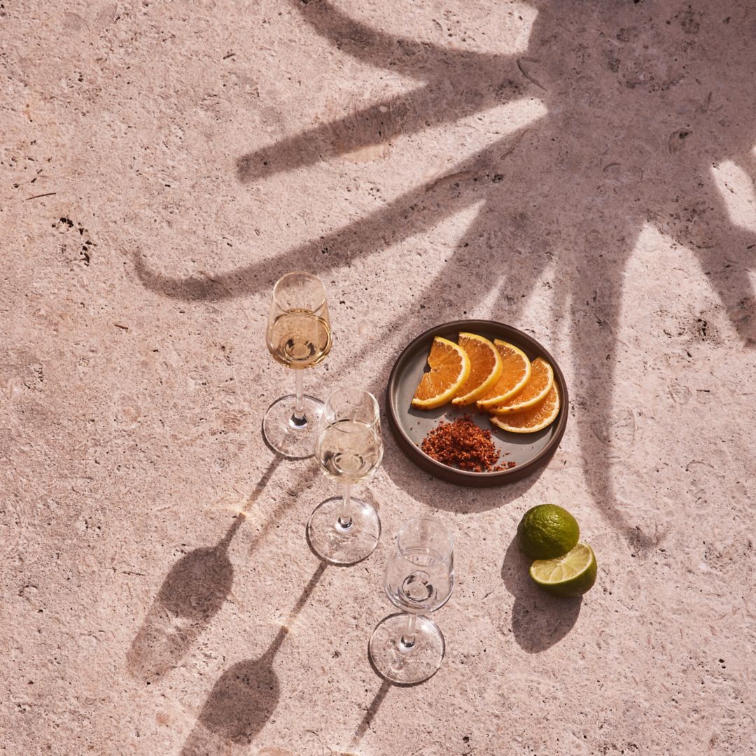 flight of tequila with orange and lime