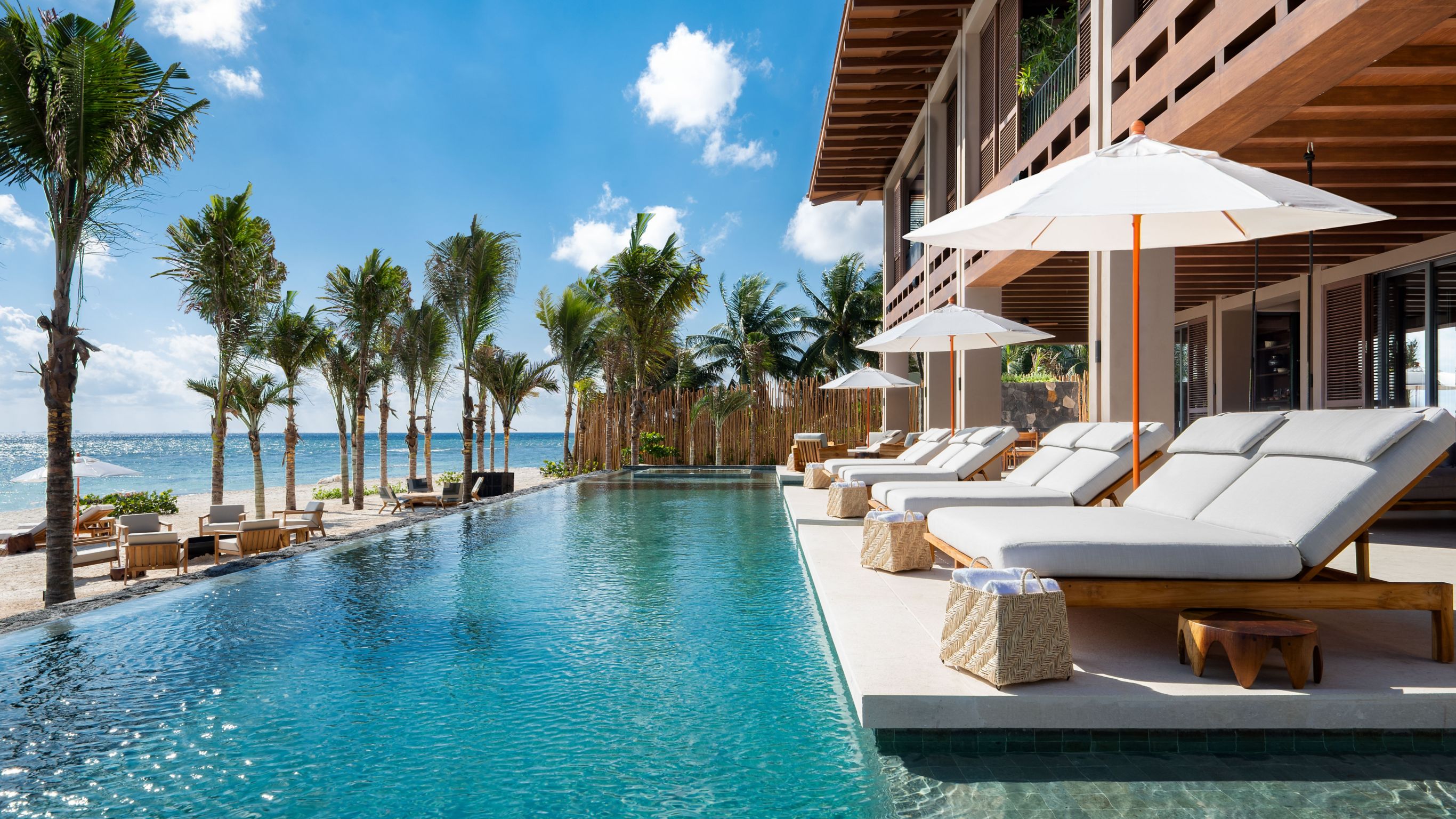 Beachfront Villa Courtyard with fountain and greenery 