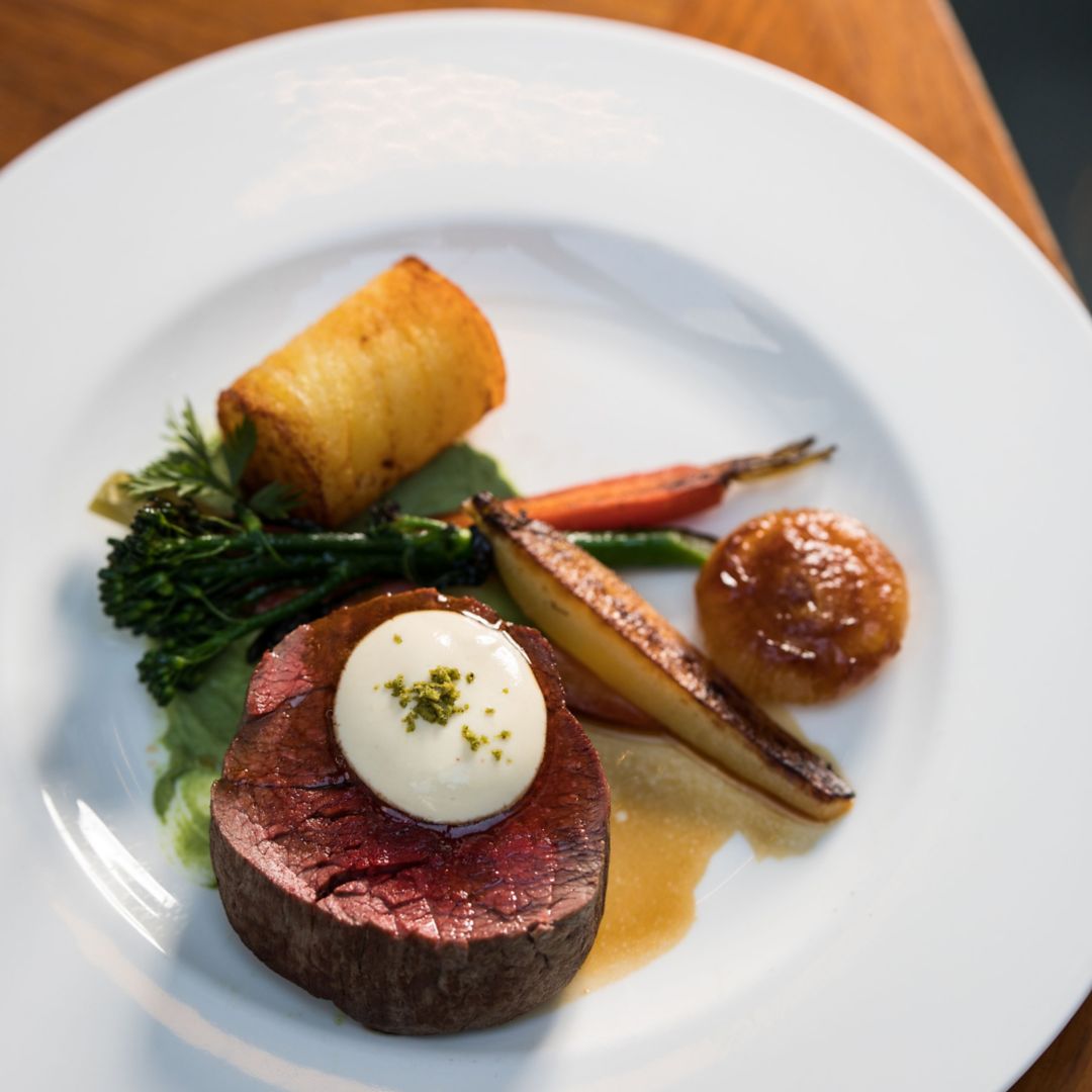 Image of a plated steak entree
