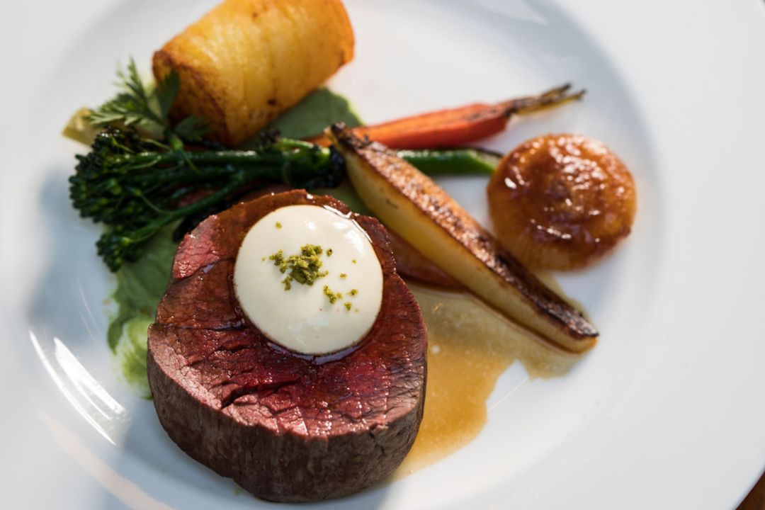 Image of a plated steak entree