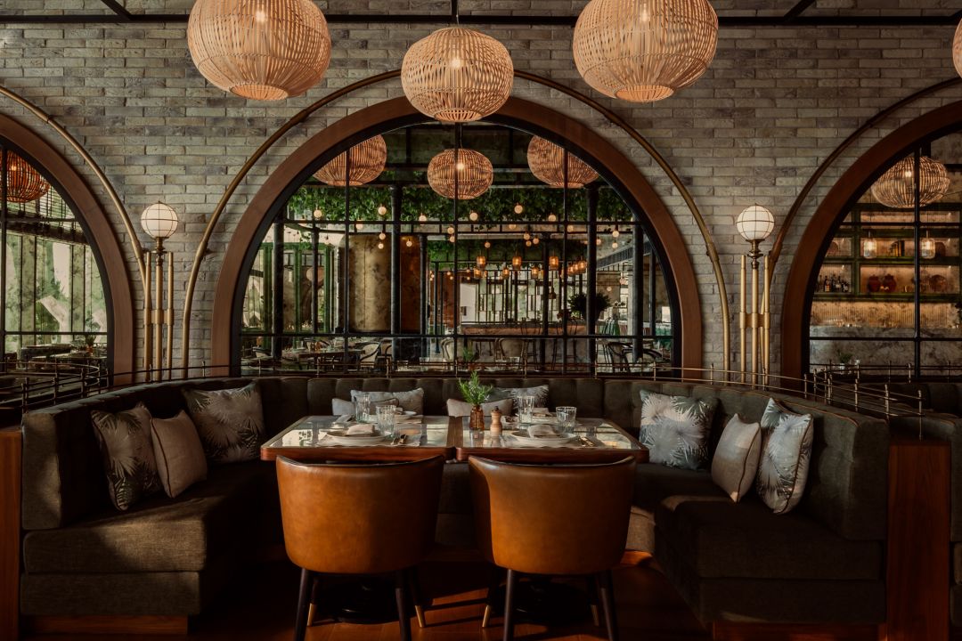 Overhead view of various Mediterranean dishes at a restaurant in Doha.