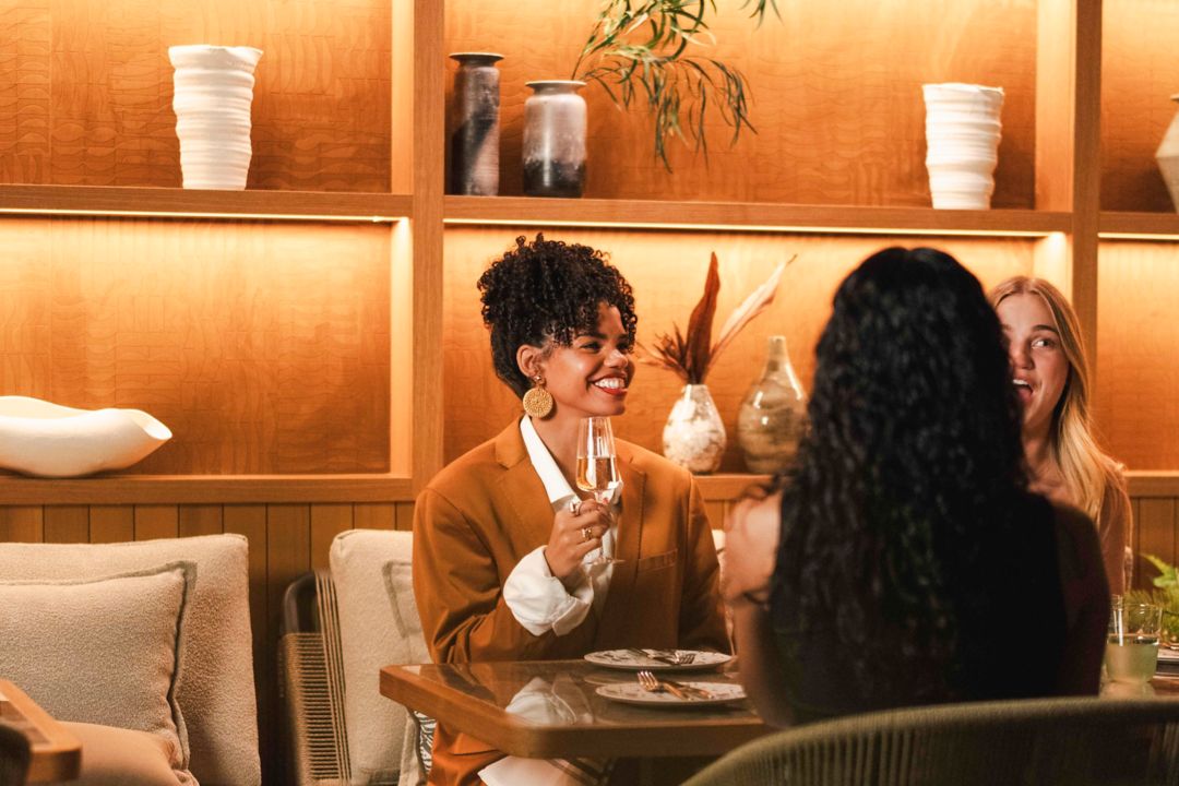 Friends dining at Reflections The Garden Terrace