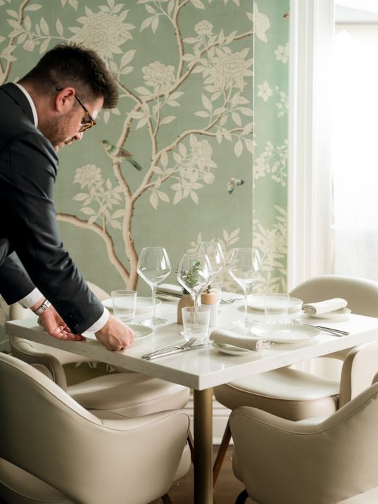 The Revere Room Manager Setting The Table