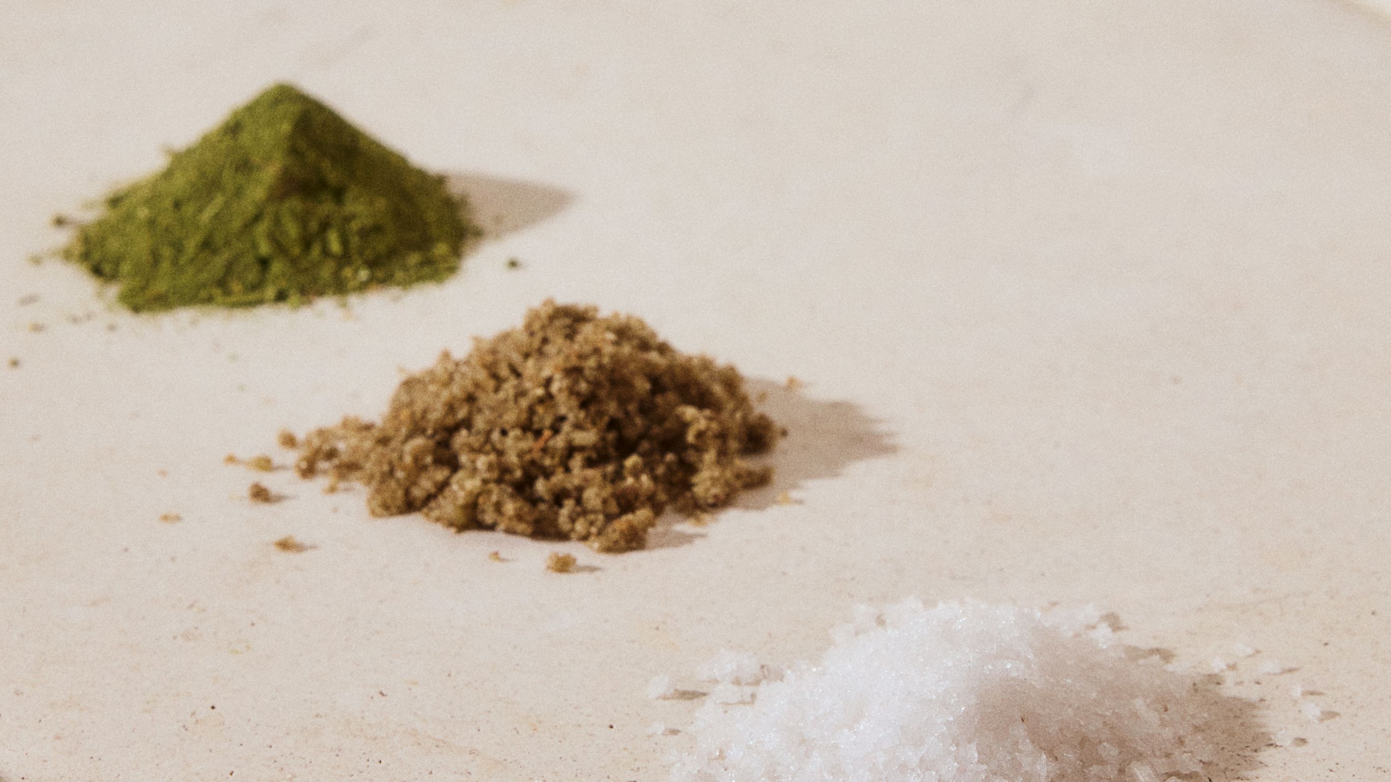 granular ingredients on white surface