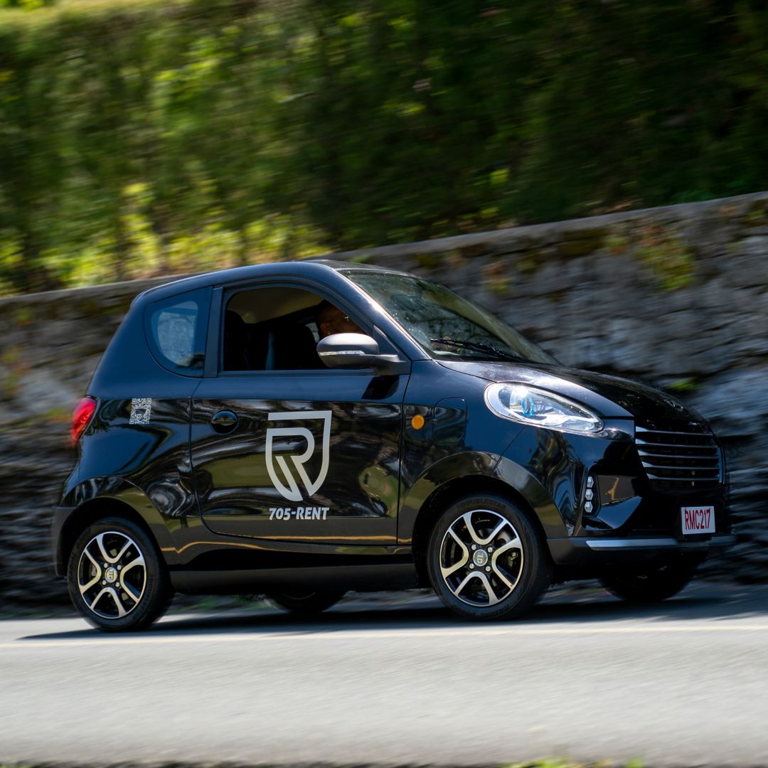 Rugged rentals driving on road in Bermuda