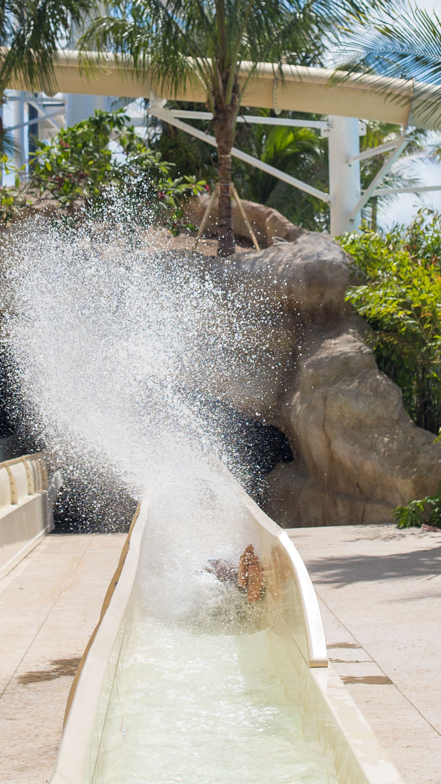 person coming down thunderball waterslide