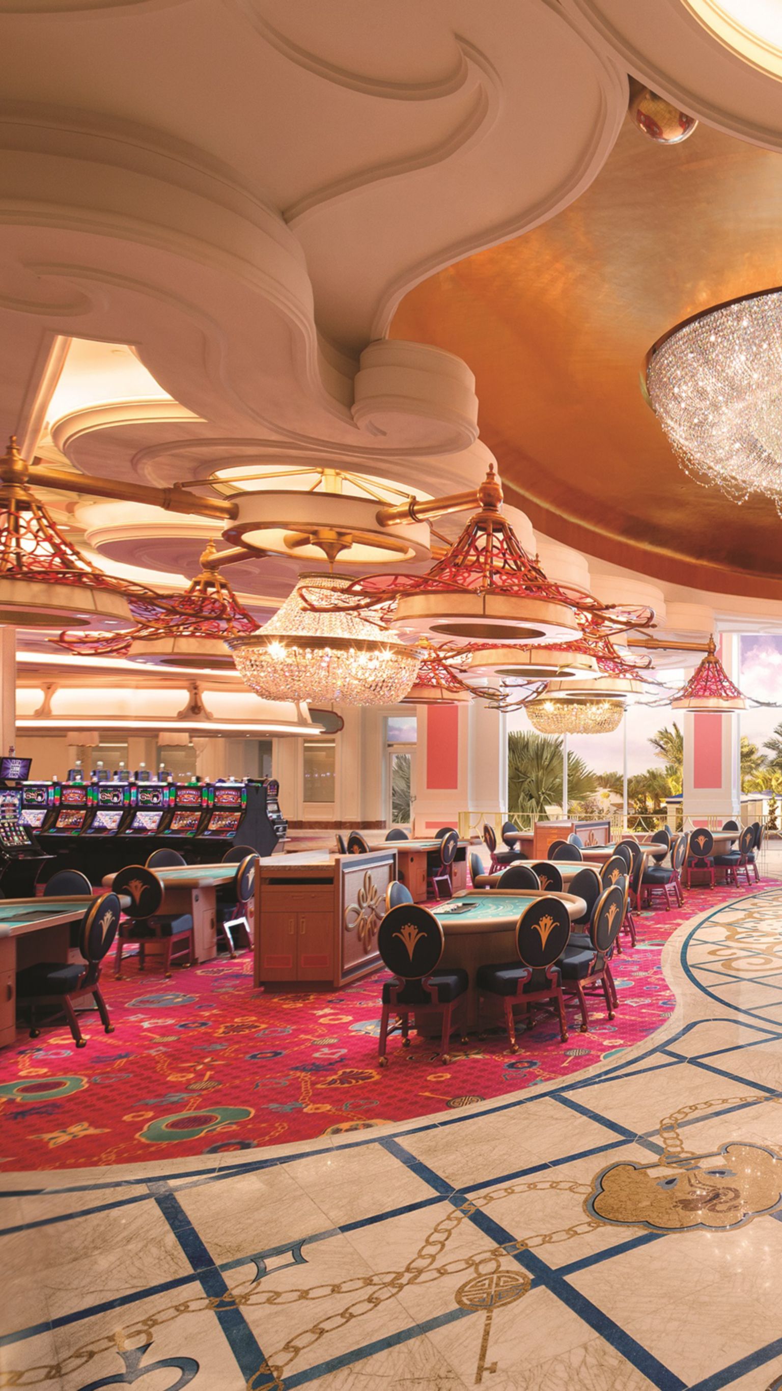 view of casino leading out windows to reflection pool