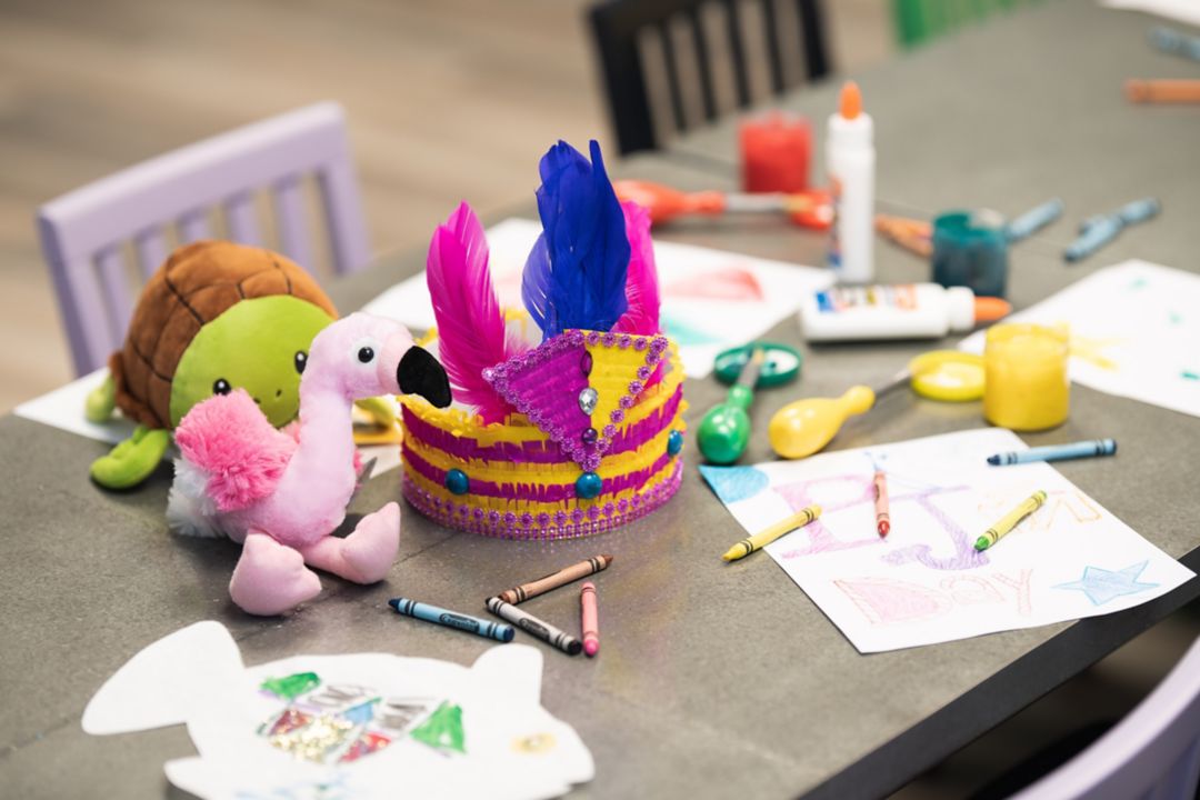 stuffed flamingo on a craft table