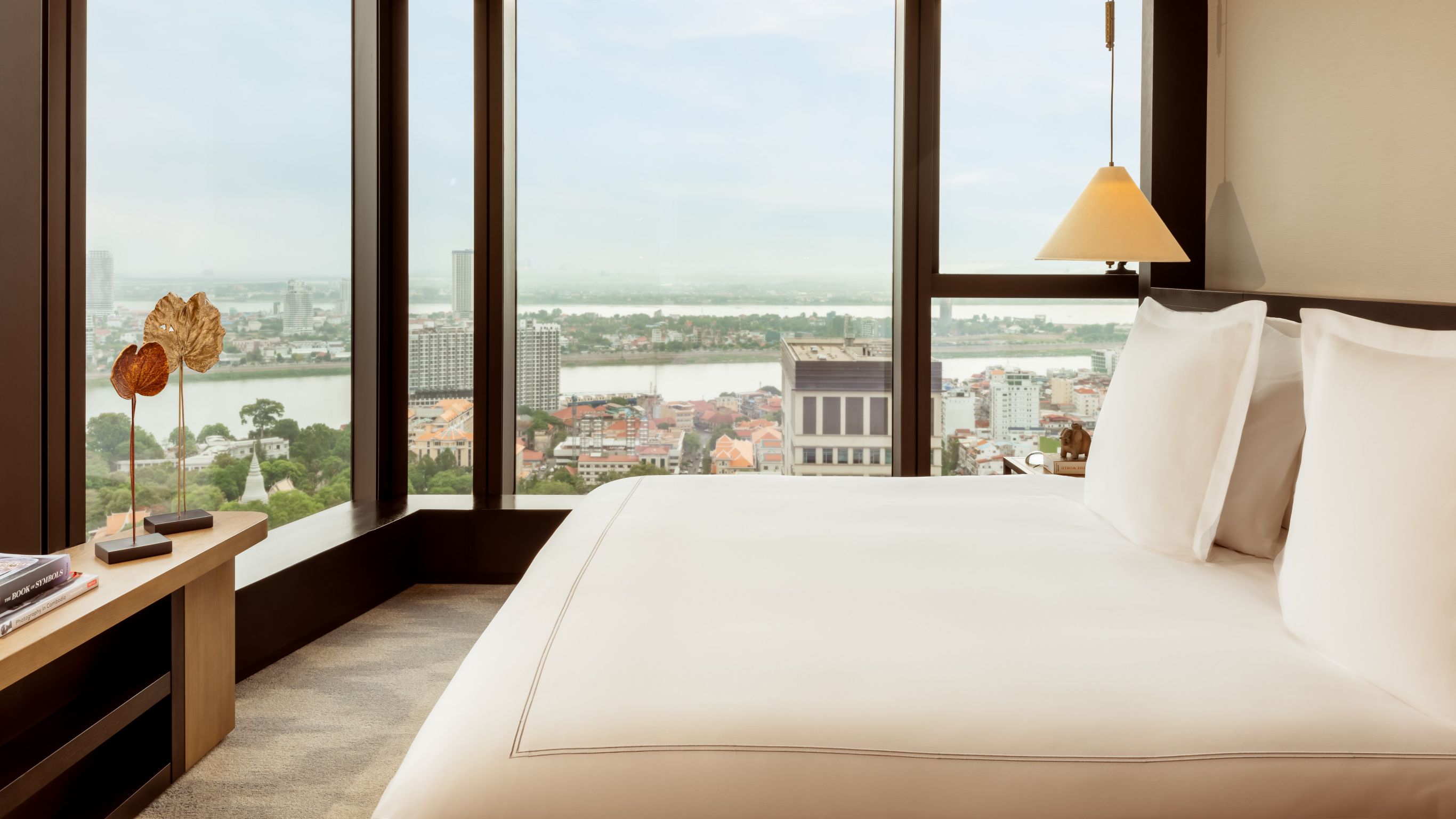 rosewood phnom penh family room premier river room and mekong suite river and city view