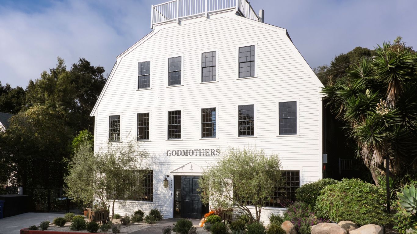 Girl playing ring toss on beach