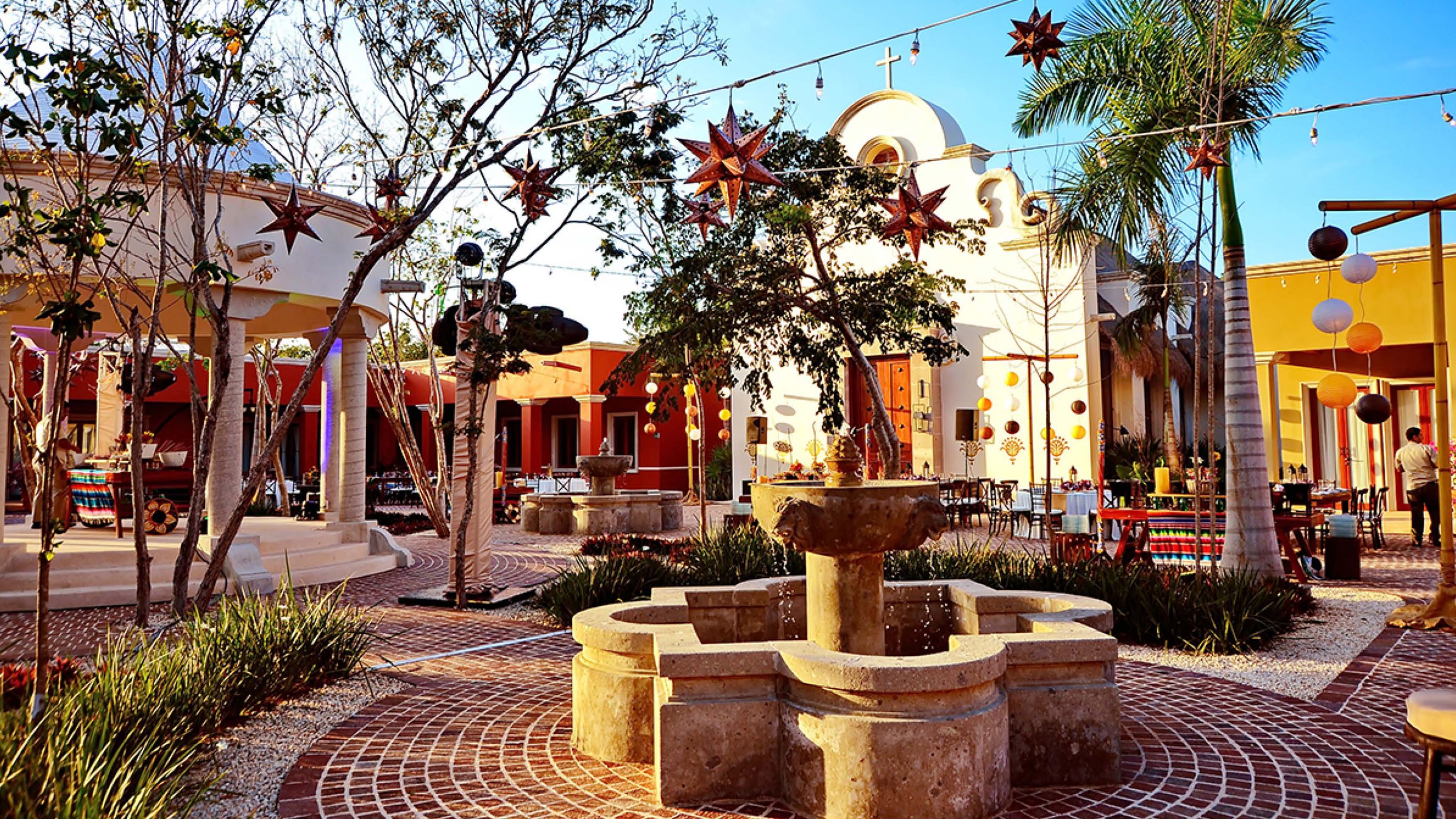 El Pueblito square set up with string lights for event