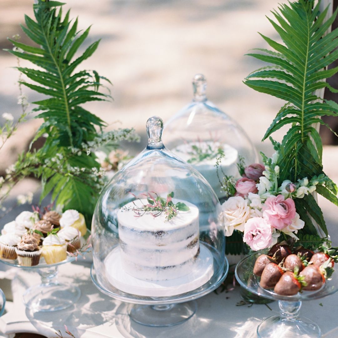 Elegant dessert table at a Caribbean resort  wedding.